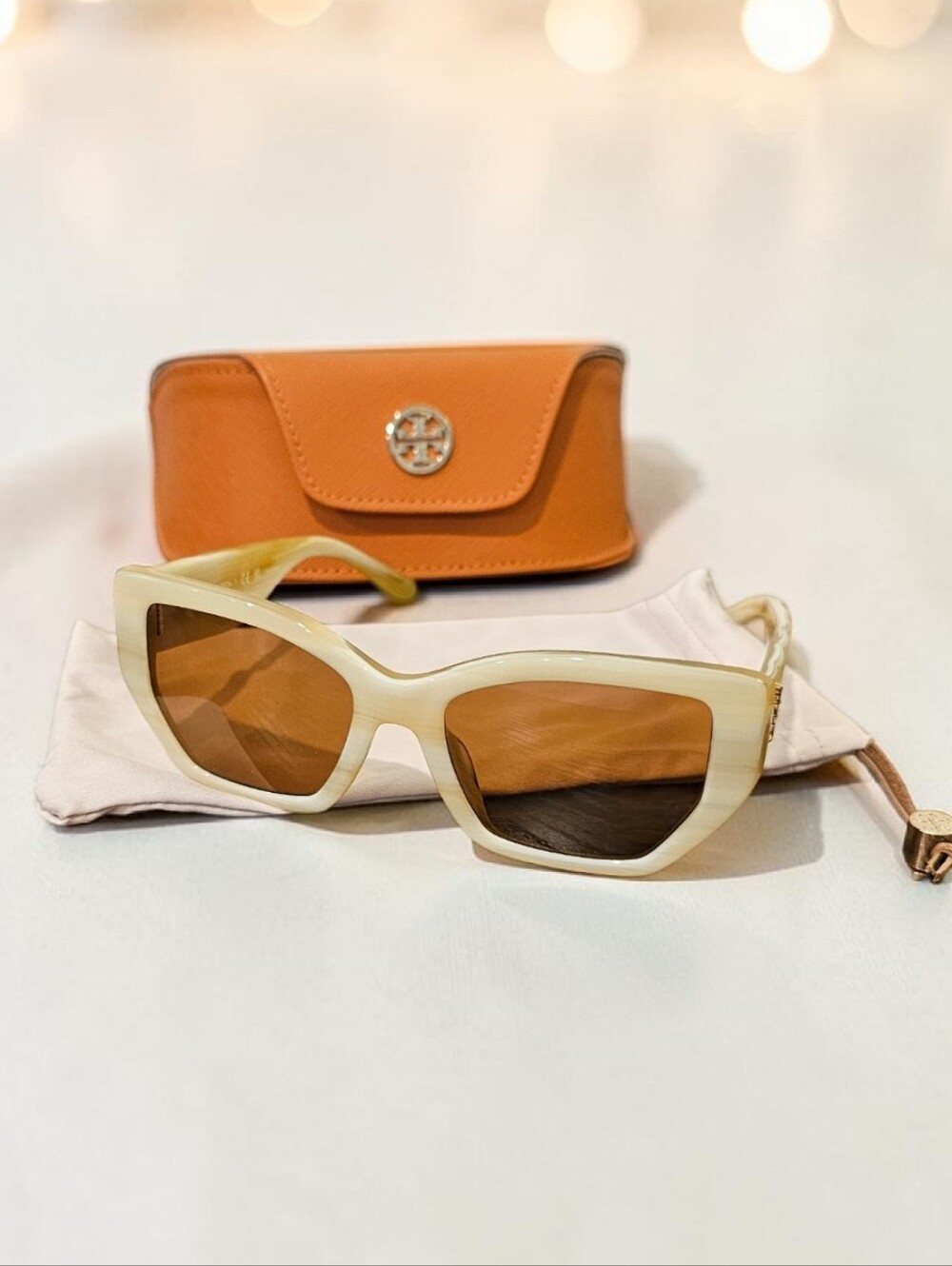 Tory Burch Cream Cat-Eye Sunglasses with Amber Lenses and Orange Case